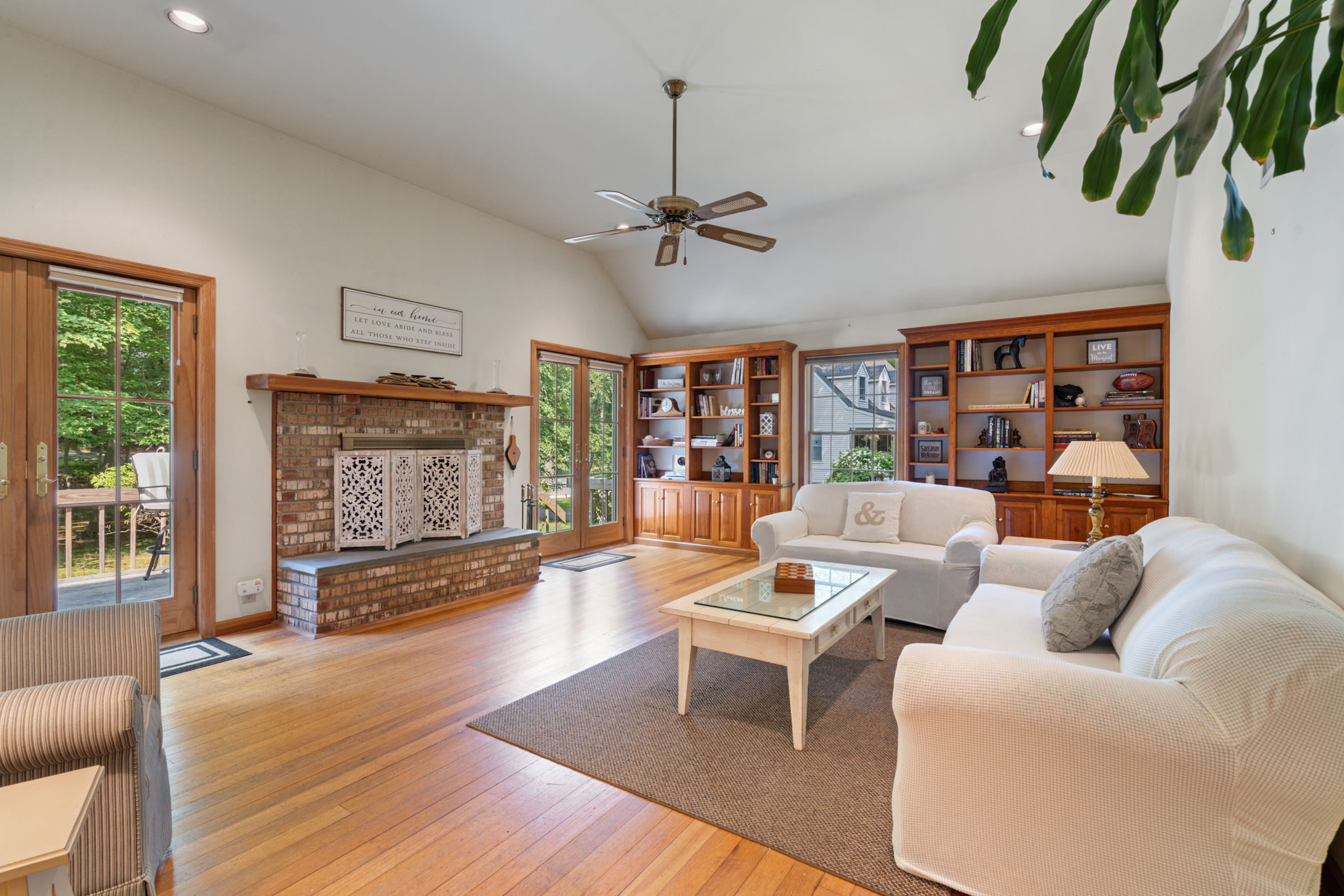 Den with fireplace at 470 Pond Path East Setauket NY